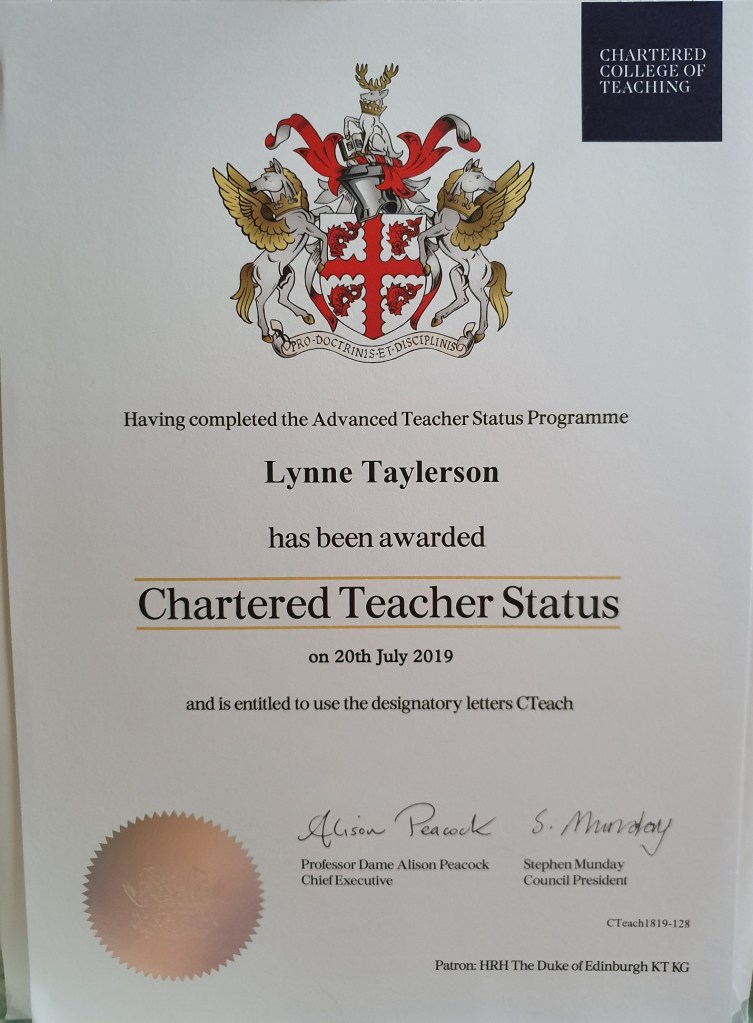 Photograph of Lynne Taylerson Chartered Teacher Status certificate from the Chartered College of Teaching.